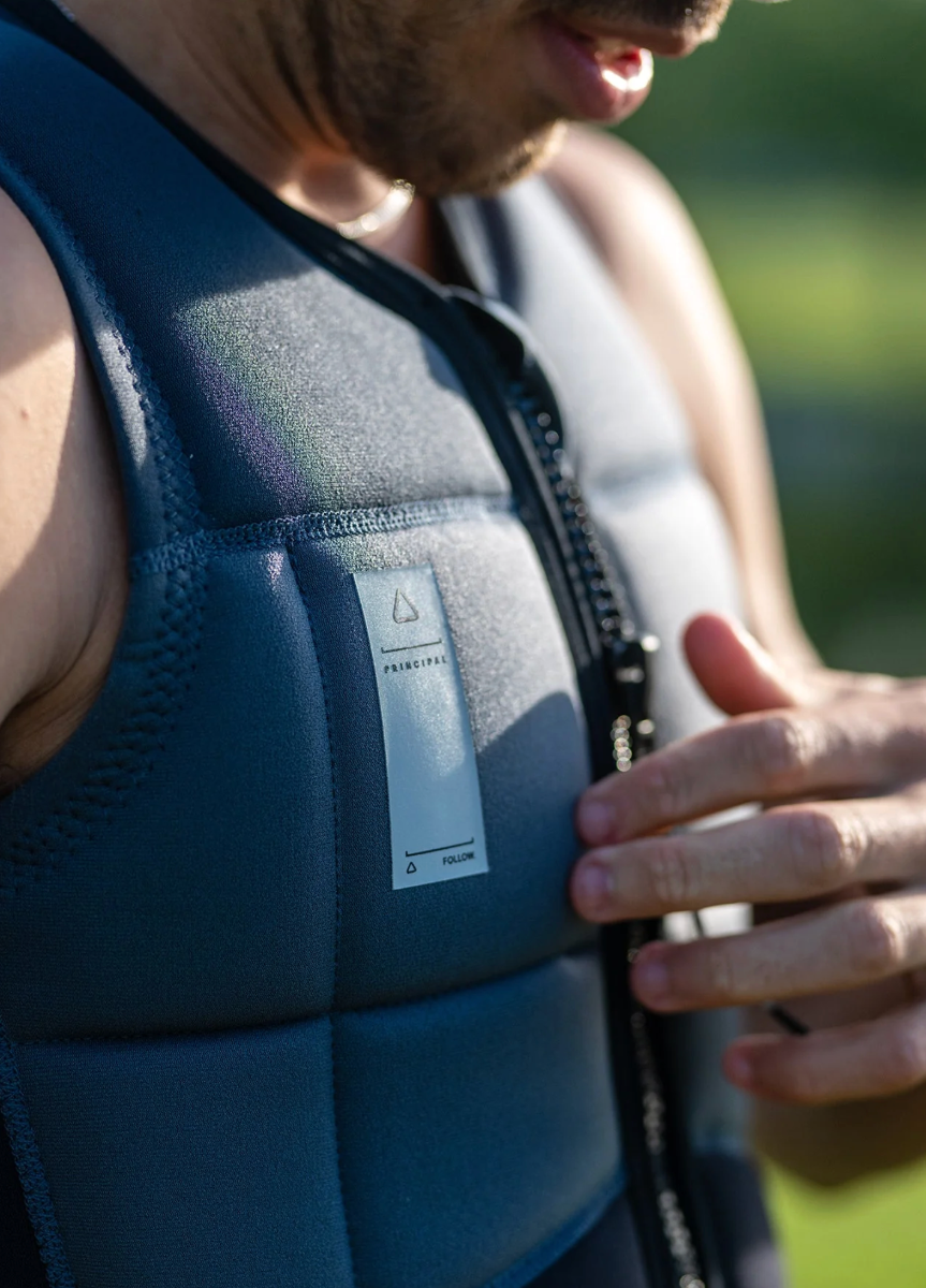 Follow Principal Impact Vest (Charcoal) - Wetndry Boardsports - Model